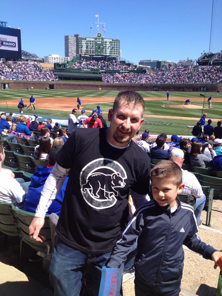 Cubs fan wearing the MLB by SustainU featuring REALTREE® Camo Chicago Cubs Tee during the week of Opening Day