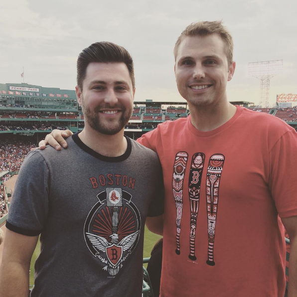 Pictured here are SustainU's VP of Production/Product Development, Patrick Adrian and CEO, Chris Yura, both wearing MLB by SustainU Tees at a Boston Red Sox game in Fenway Park.